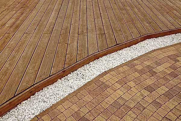 Is a Deck or Patio Better for Garden Design?