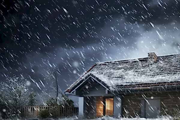 a photo showing a house during a hail storm, the occupants can expect to find hail damage, fence hail damage and hail damage to a wooden fence