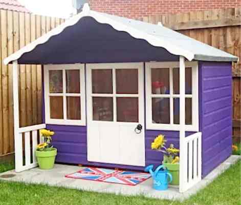 this image shows one of our outdoor play ideas which include a play area in the garden, garden play area ideas, playhouse ideas and garden playground ideas