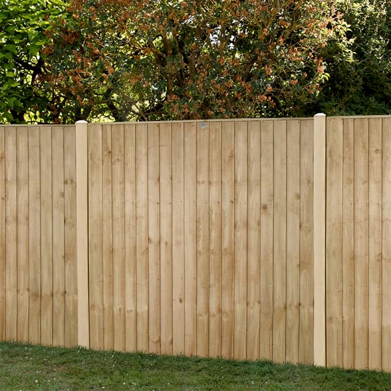 Forest 6' x 5' Pressure Treated Vertical Closeboard Fence Panel in a garden