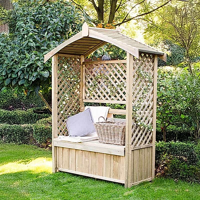 A traditional wooden Forest Lyon Garden Arbour Seat with lattice sides and back