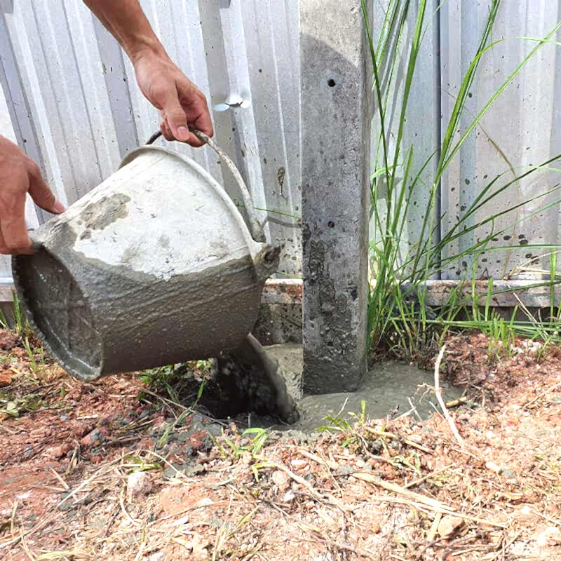 This image shows a stage in installing fence posts. To do this you will need to know how to install fence posts, how to install a fence post and how to set fence posts