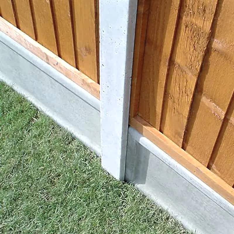 a photo of concrete fence post and some eco-friendly fence panels that are made using sustainable fence materials to create eco-friendly fencing