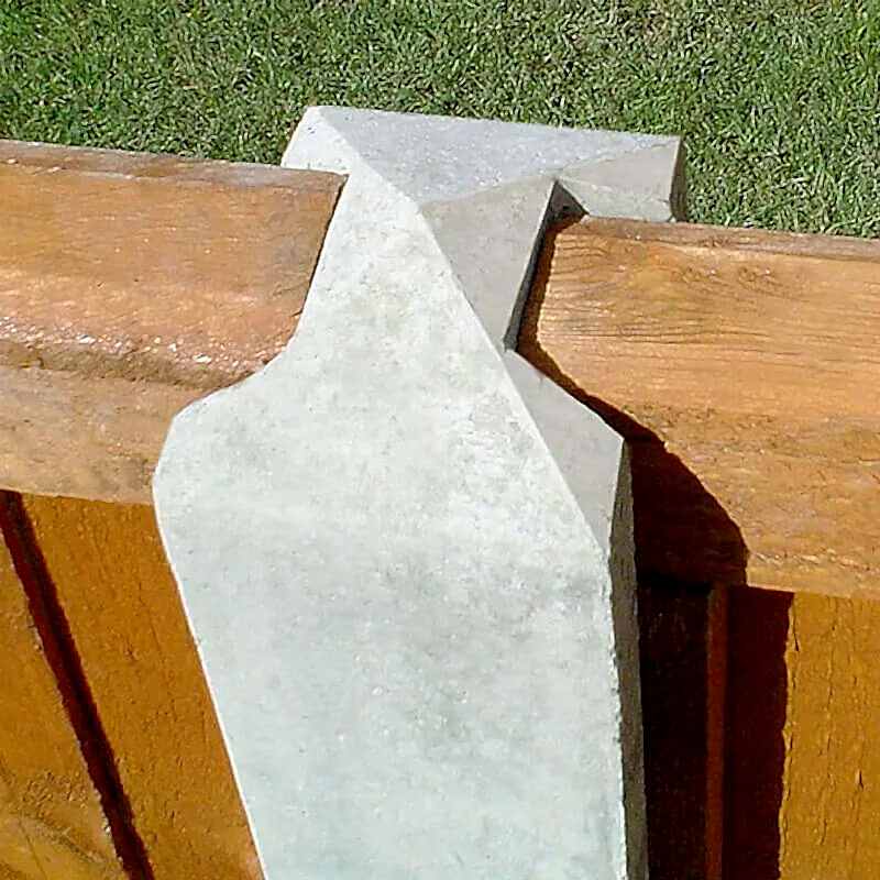 This image shows a stage in installing fence posts. To do this you will need to know how to install fence posts, how to install a fence post and how to set fence posts