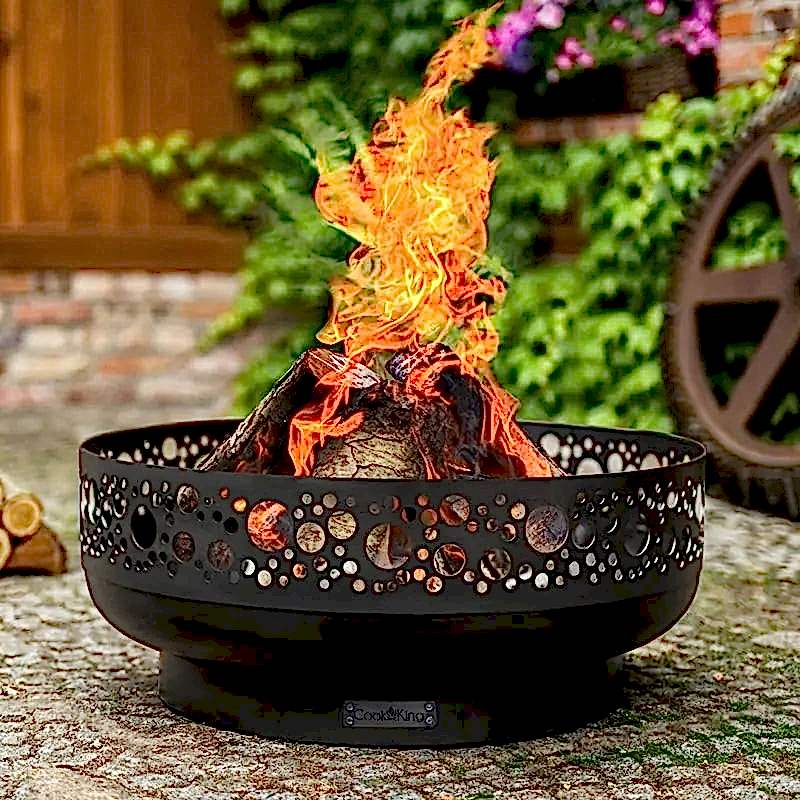 add some warmth to your garden transformation with this black steel fire bowl