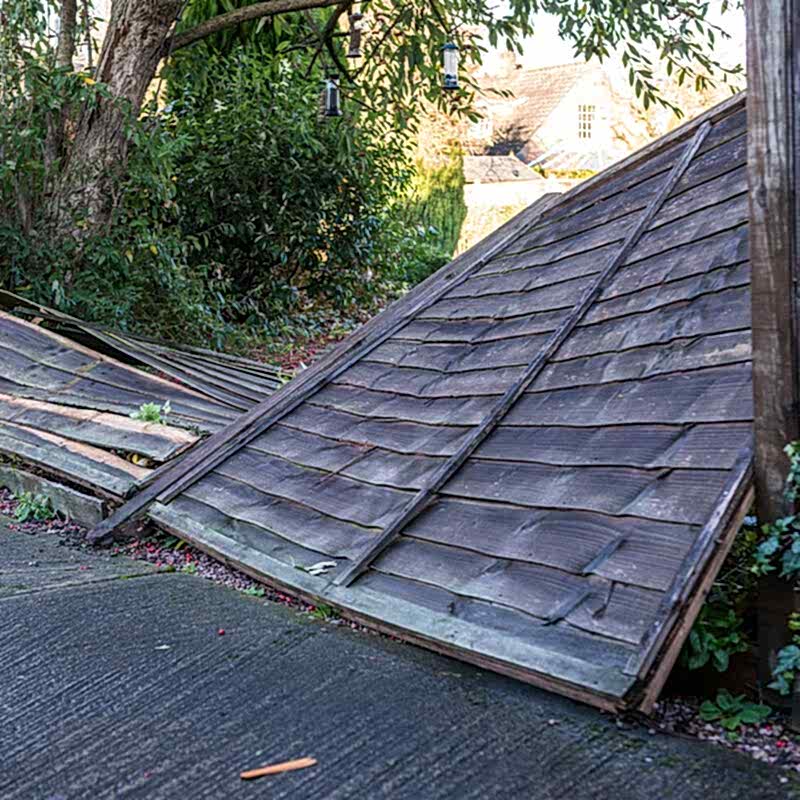 a photo showing a fence exhibiting hail damage, fence hail damage and hail damage to a wooden fence