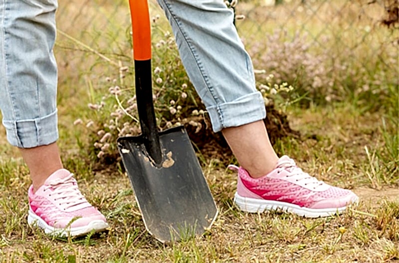 Digging a fence post hole Digging a fence post hole