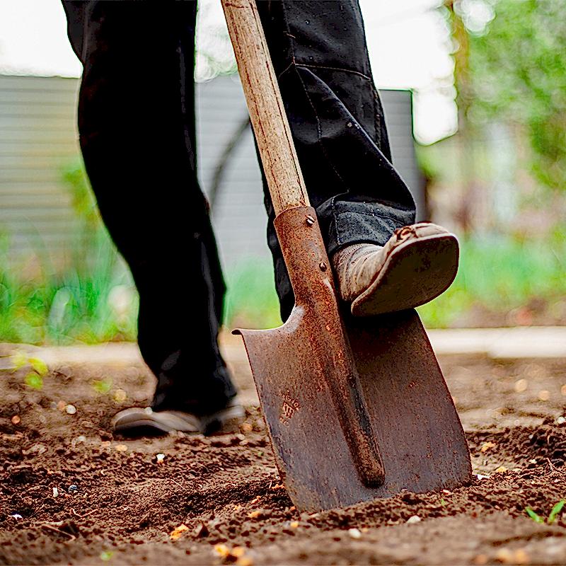 person digging hole