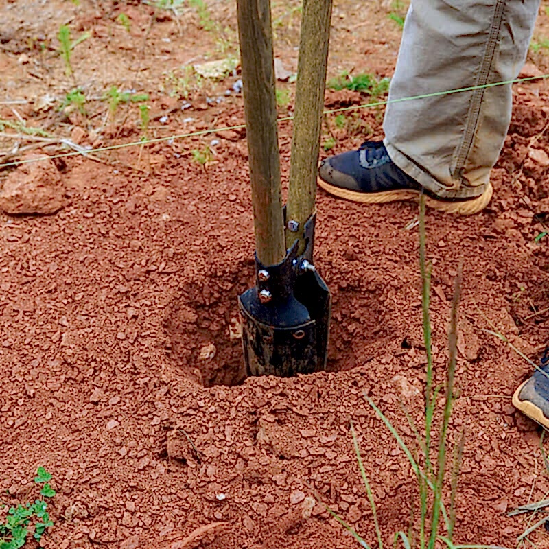 This image shows a stage in installing fence posts. To do this you will need to know how to install fence posts, how to install a fence post and how to set fence posts