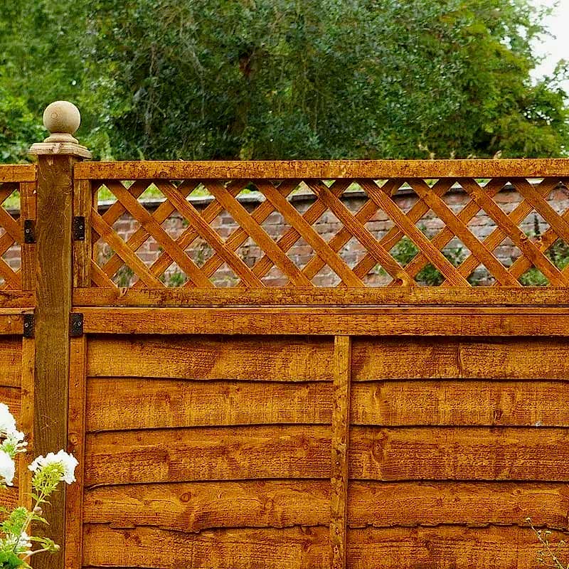 the owner of this pristine fence will not need to worry about how to replace a fence panel, replacing a fence panel or replacing fence panels in concrete posts anytime soon