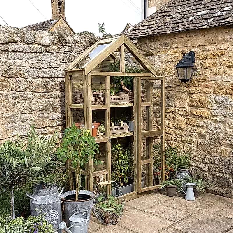tall wall greenhouse in a vintage style