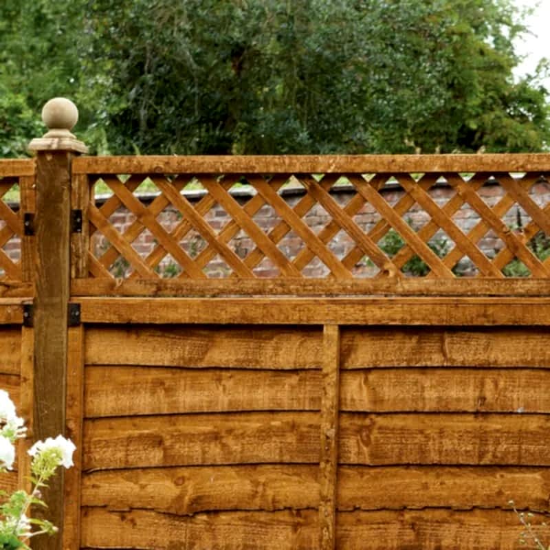 a dip treated trellis fence topper