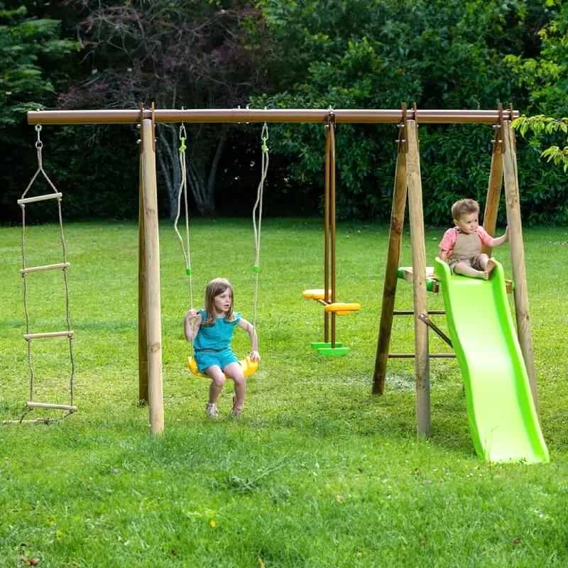 this image shows one of our outdoor play ideas which include a play area in the garden, garden play area ideas, playhouse ideas and garden playground ideas