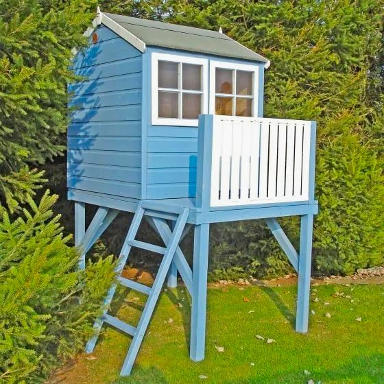 this image shows one of our outdoor play ideas which include a play area in the garden, garden play area ideas, playhouse ideas and garden playground ideas