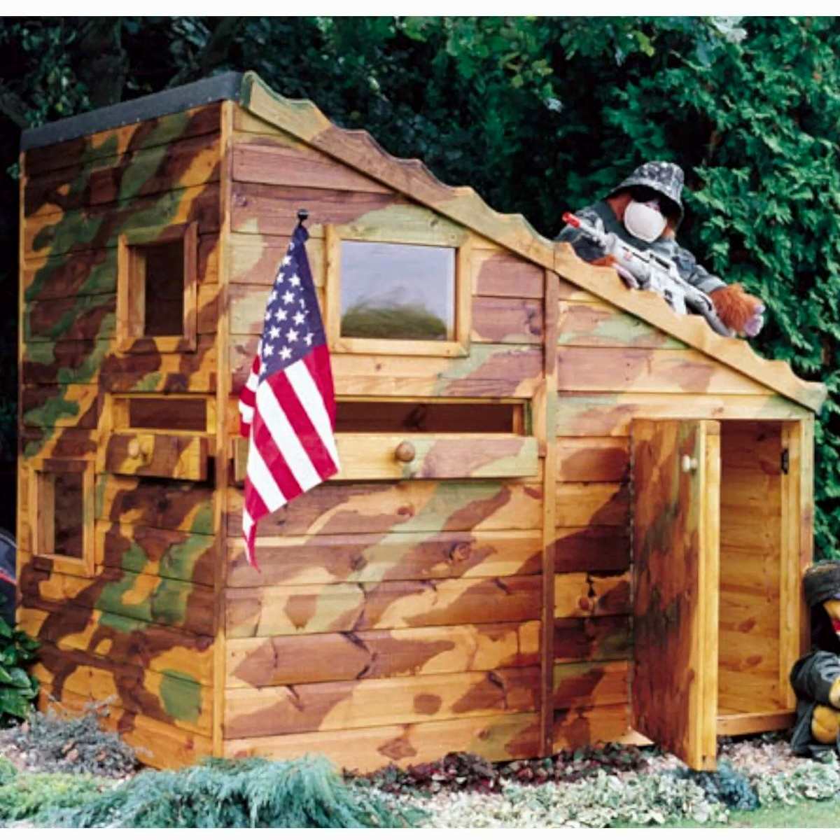 this image shows one of our outdoor play ideas which include a play area in the garden, garden play area ideas, playhouse ideas and garden playground ideas