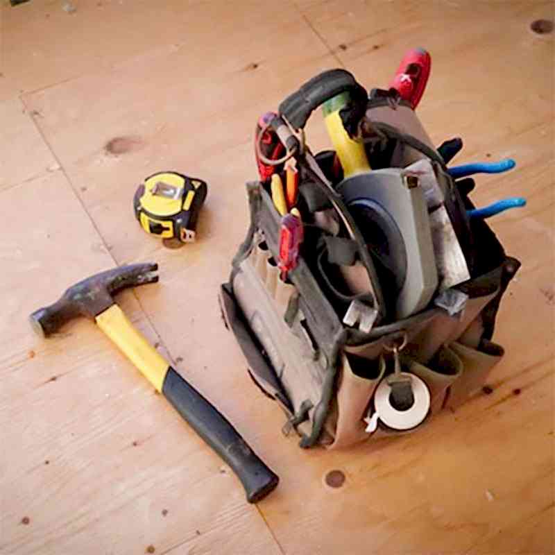 a bag of tools needed for fixing a fence