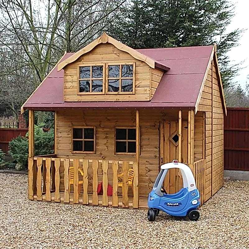 this image shows one of our outdoor play ideas which include a play area in the garden, garden play area ideas, playhouse ideas and garden playground ideas