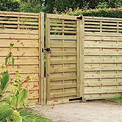Buy the Forest Kyoto 3 x 6 Decorative Pressure Treated Wooden Gate now a decorative wooden gate and matching fencing, both with slatted top