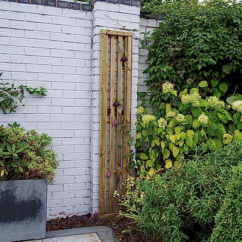 Vertical slatted garden screen panel Vertical slatted garden screen panel